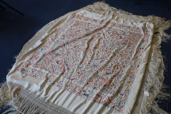 A Chinese embroidered silk table cover, late Qing dynasty, 153cm square excluding fringe